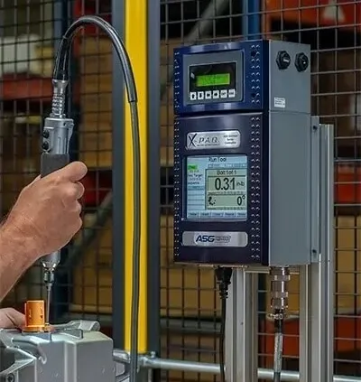 Handheld torque controlled tool with ASG X-PAQ controller
