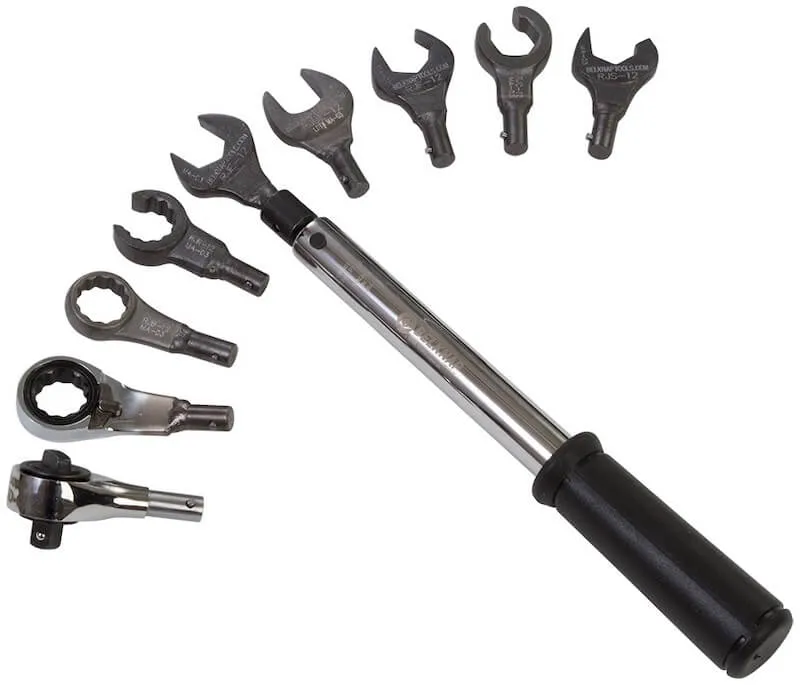 Preset torque wrench with interchangeable drive ends